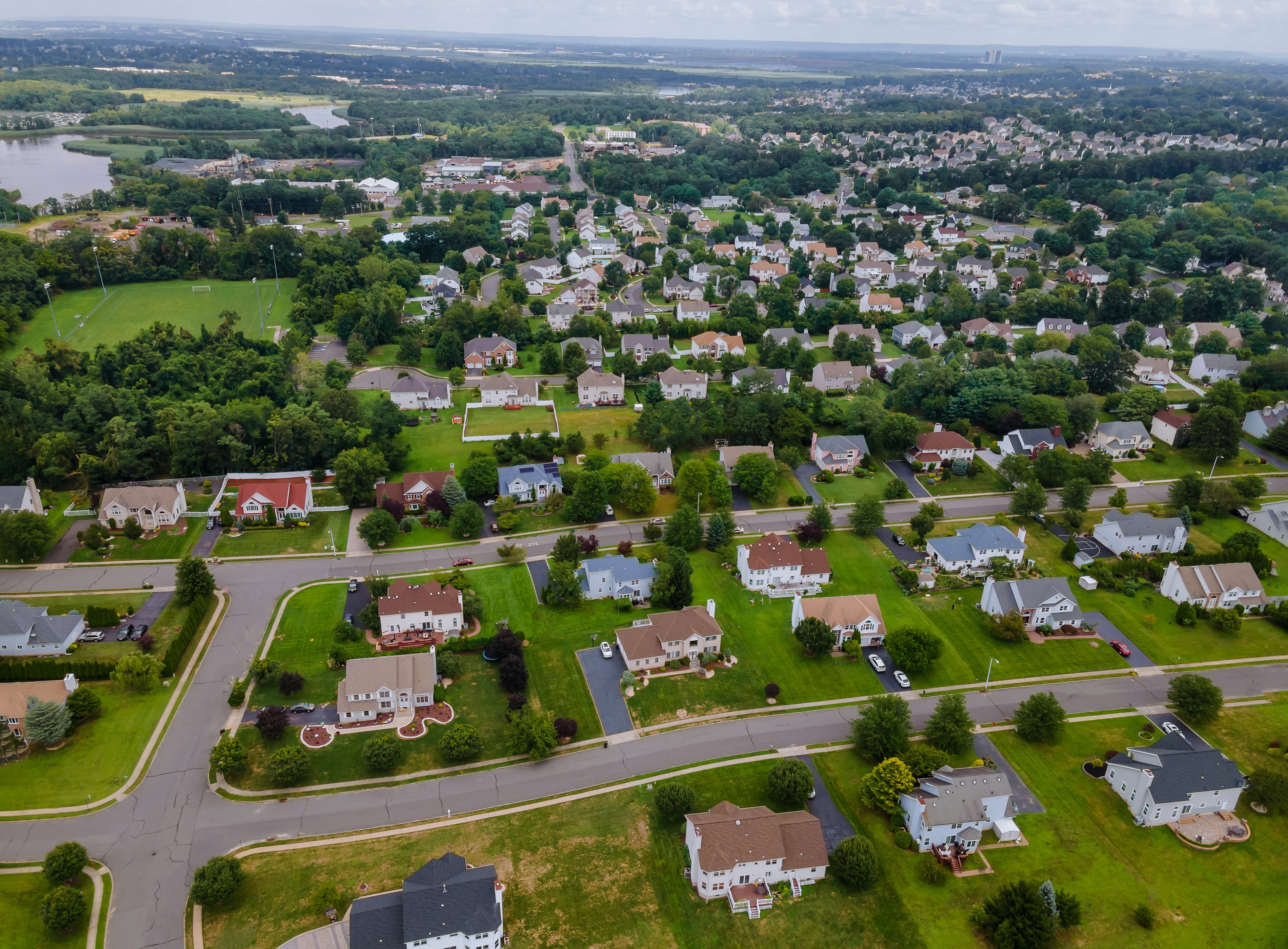 Panoramic view of a neighborhood showing roofs of houses in a residential area