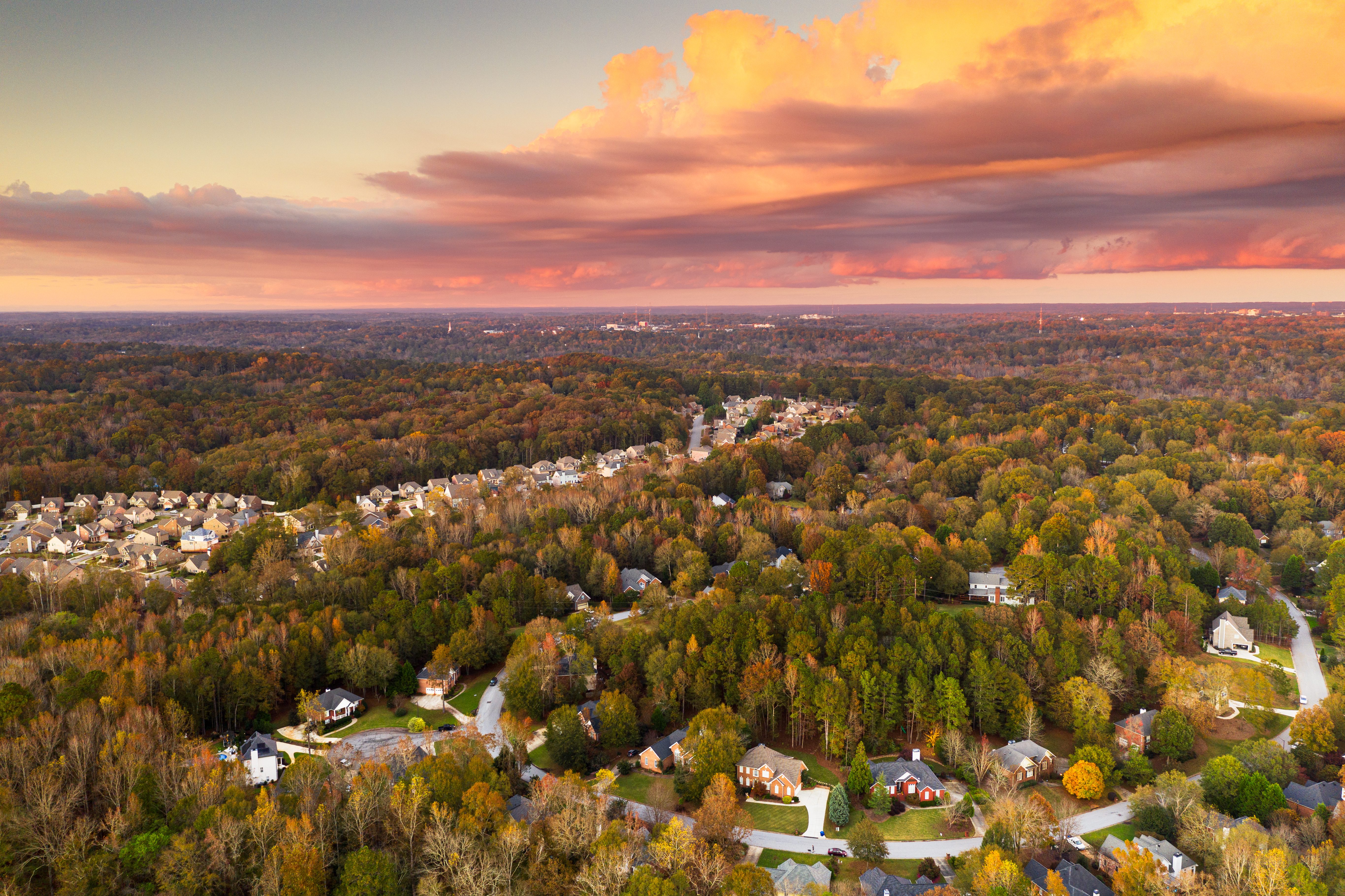 Suburban Bon Air neighborhoods viewed from above during an autumn dusk.